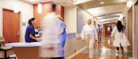 nurse walking down hall